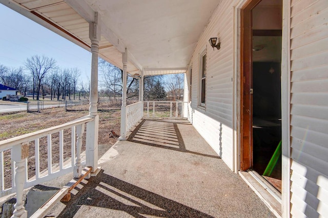 view of patio featuring a porch