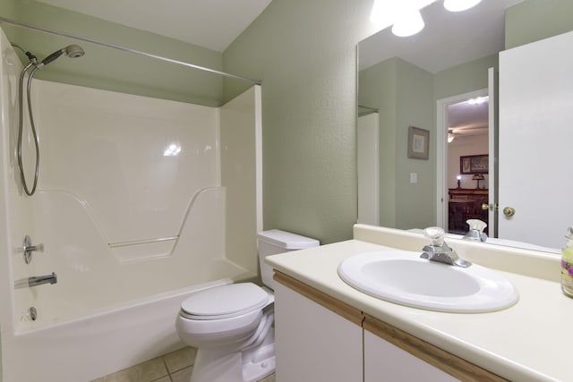 bathroom featuring bathtub / shower combination, tile patterned floors, toilet, and vanity