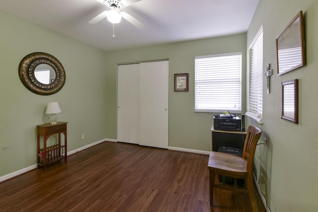 miscellaneous room with wood finished floors, baseboards, and ceiling fan