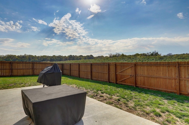 view of patio with a fenced backyard