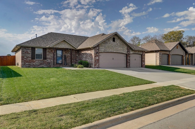 view of front of property with driveway, a front lawn, fence, an attached garage, and a shingled roof