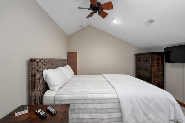 bedroom featuring vaulted ceiling, visible vents, and ceiling fan