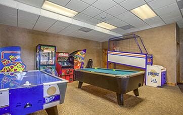 recreation room featuring billiards and a paneled ceiling