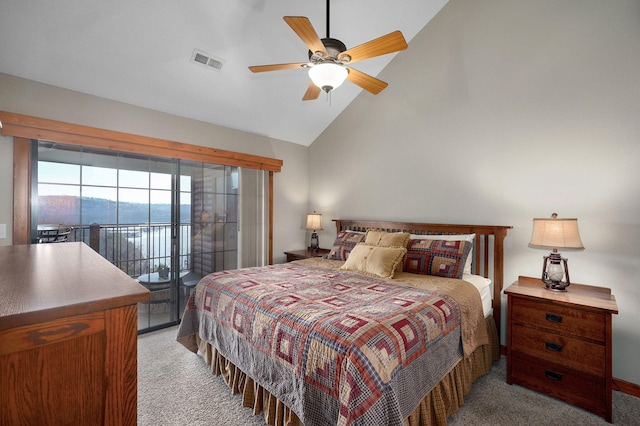 bedroom featuring access to exterior, light colored carpet, visible vents, and high vaulted ceiling