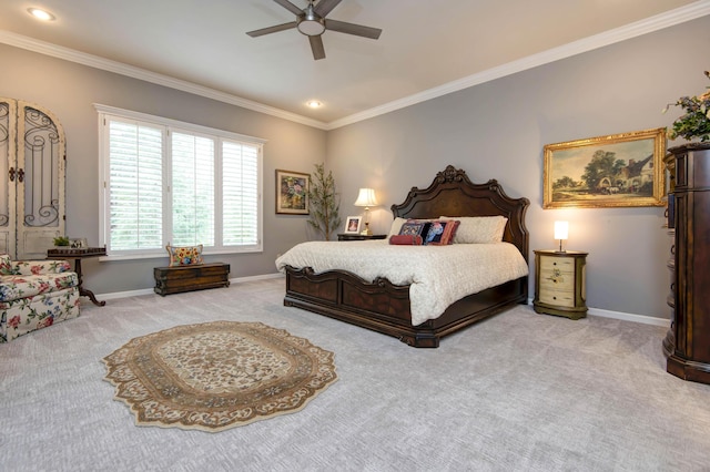 bedroom with ceiling fan, baseboards, carpet floors, and ornamental molding