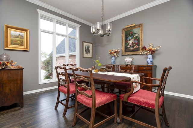 dining area with crown molding, wood finished floors, visible vents, and baseboards