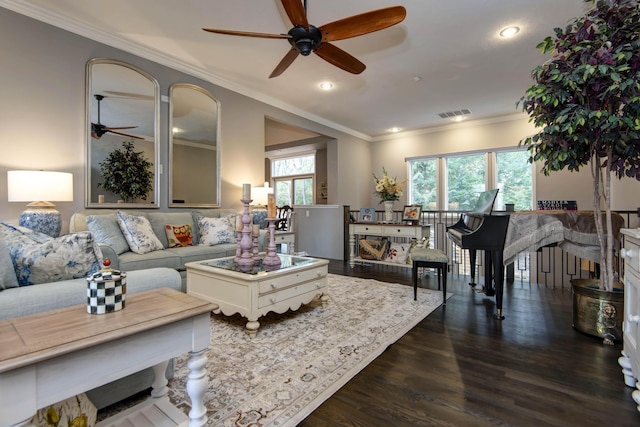 living room featuring recessed lighting, visible vents, dark wood finished floors, and ornamental molding