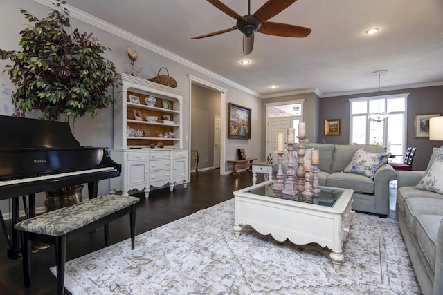 living area with recessed lighting, wood finished floors, a ceiling fan, and ornamental molding