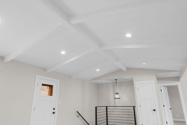 interior space with beamed ceiling and recessed lighting