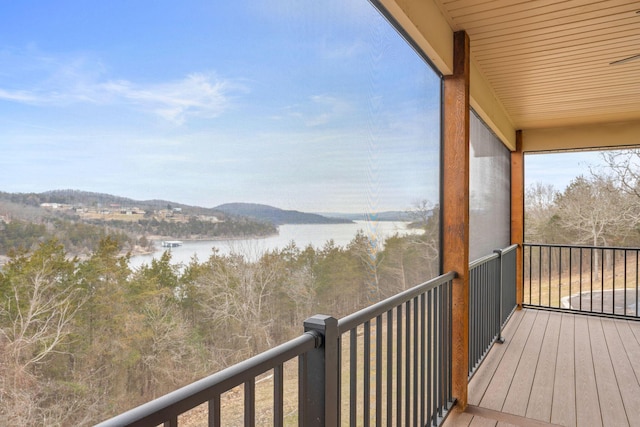 balcony featuring a water view