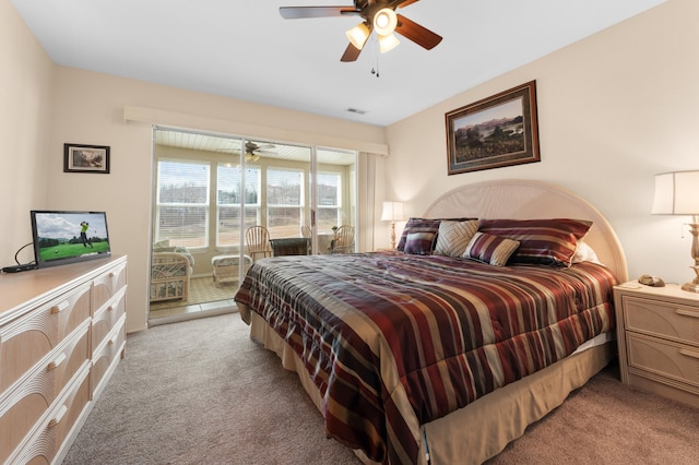 bedroom with light carpet, visible vents, a ceiling fan, and access to outside