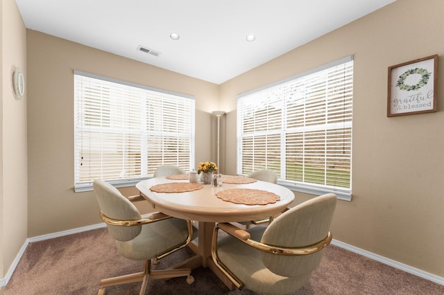 dining space with visible vents, recessed lighting, baseboards, and carpet