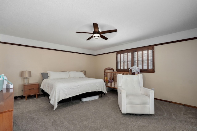 bedroom featuring carpet flooring, a ceiling fan, and baseboards