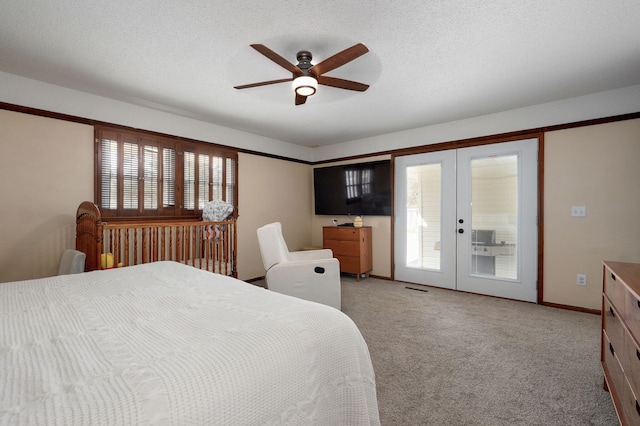 bedroom with a ceiling fan, access to exterior, french doors, a textured ceiling, and light colored carpet