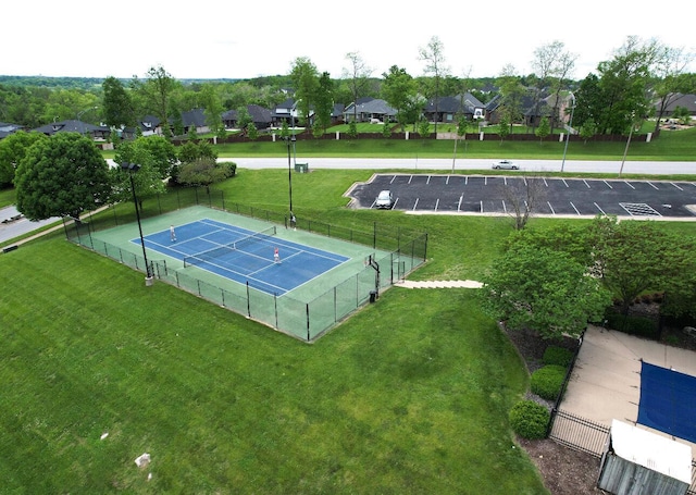 birds eye view of property with a residential view