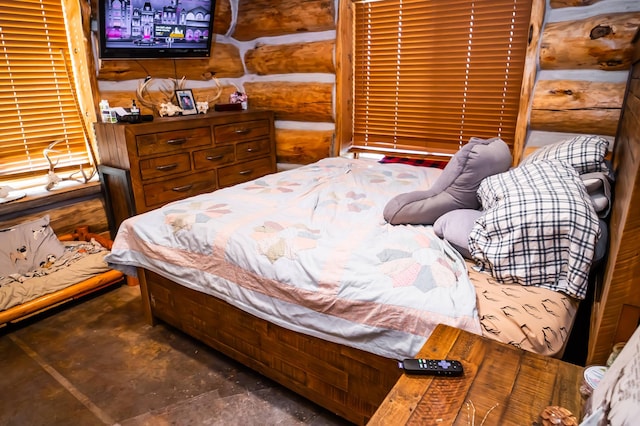 bedroom featuring rustic walls