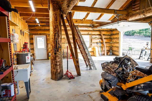 garage featuring electric water heater