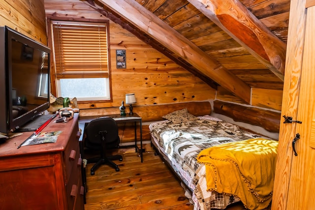 bedroom featuring hardwood / wood-style flooring, wooden walls, beamed ceiling, and wooden ceiling