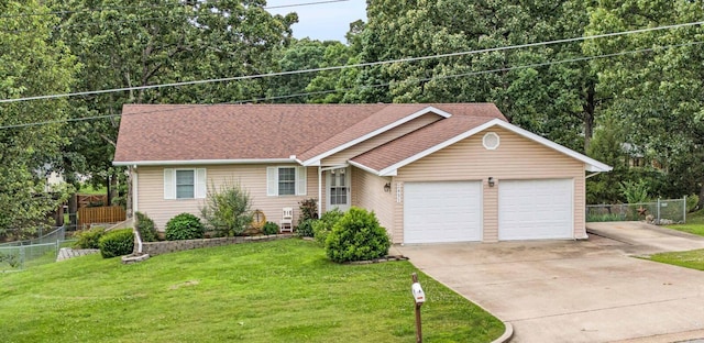 ranch-style house with a front yard, fence, driveway, an attached garage, and a shingled roof