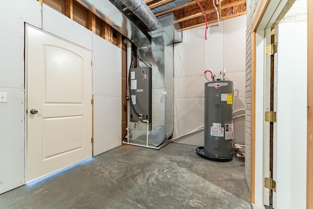 utility room with electric water heater