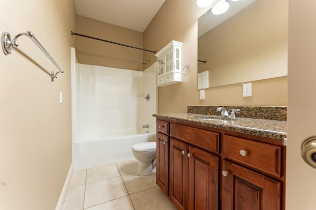 full bath featuring vanity, baseboards, tile patterned flooring, shower / tub combination, and toilet