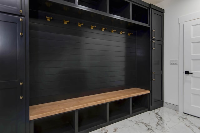 mudroom with marble finish floor