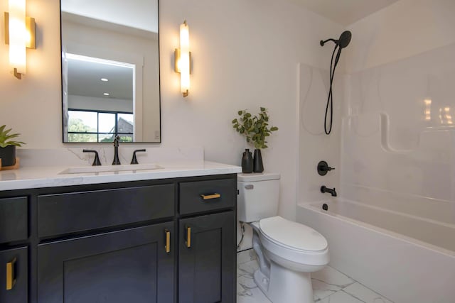 full bathroom with toilet, marble finish floor, vanity, and shower / tub combination