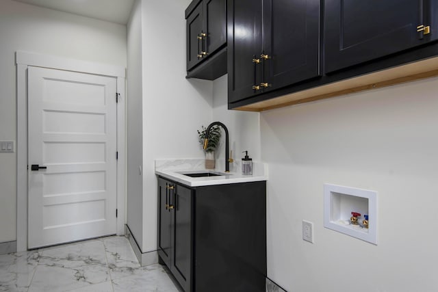 washroom featuring hookup for a washing machine, cabinet space, a sink, marble finish floor, and indoor bar