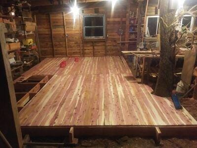 interior space featuring wood walls and wood-type flooring