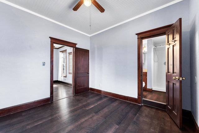 empty room with hardwood / wood-style flooring, baseboards, and ceiling fan