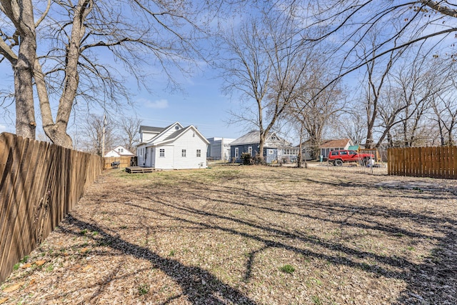 view of yard featuring a fenced backyard