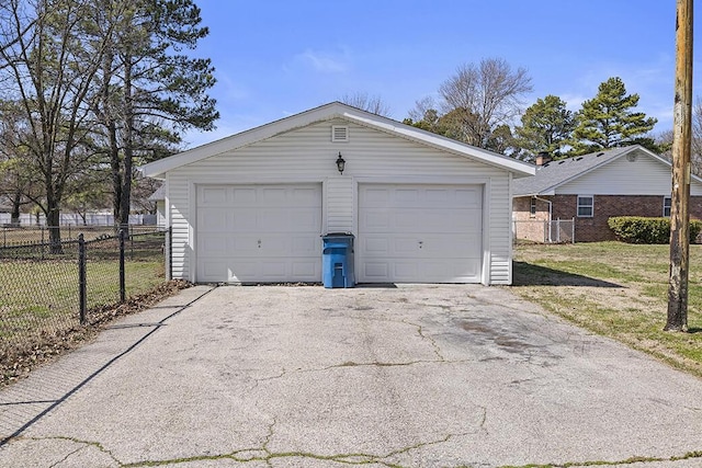 detached garage with fence