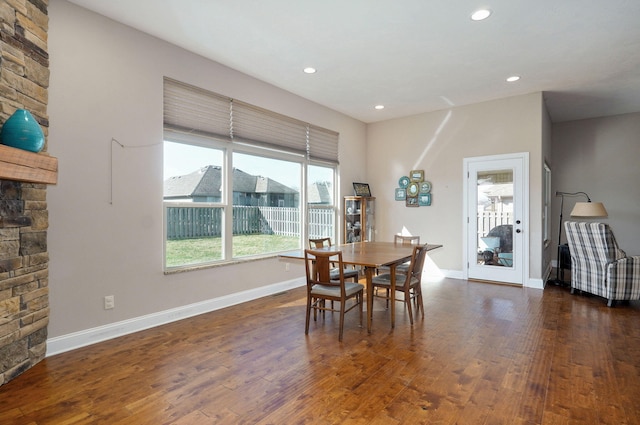 dining room featuring recessed lighting, baseboards, and dark wood-style flooring