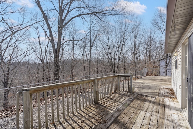 deck featuring a view of trees