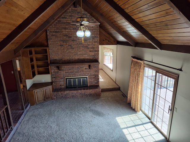 unfurnished living room featuring a brick fireplace, carpet, wood ceiling, and vaulted ceiling with beams