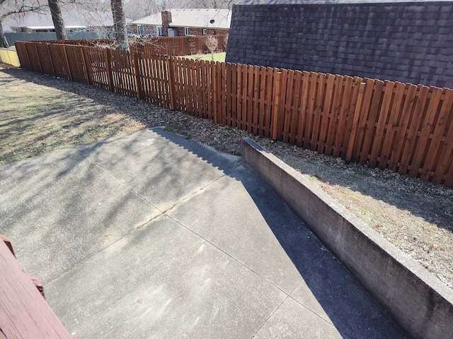 exterior space featuring a fenced backyard