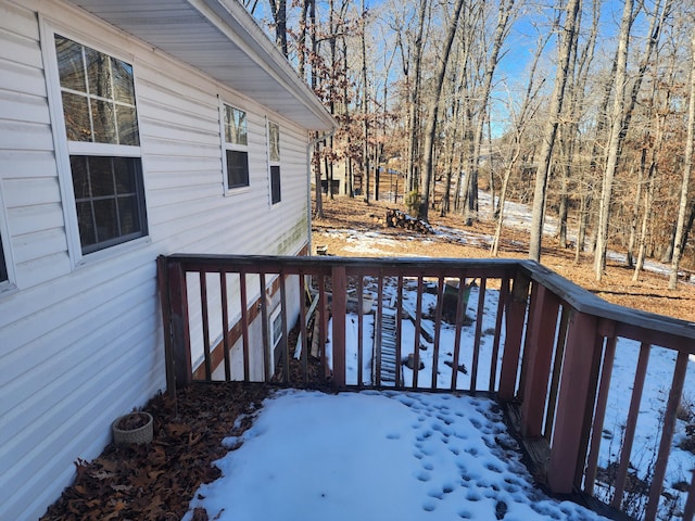 view of snow covered deck