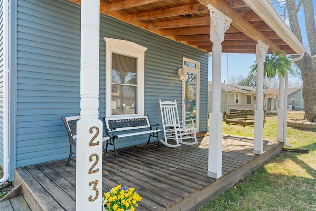 wooden deck featuring a porch