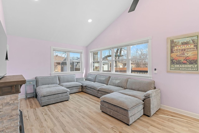 living area featuring recessed lighting, baseboards, high vaulted ceiling, and wood finished floors