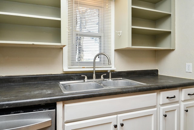 kitchen featuring a sink, dishwasher, white cabinetry, and open shelves