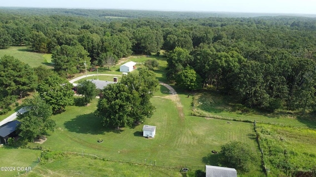 bird's eye view featuring a view of trees
