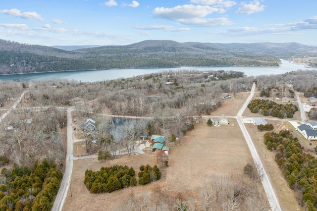 aerial view featuring a water and mountain view