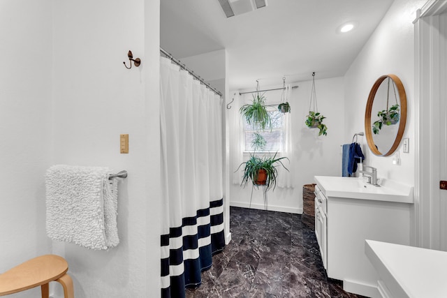 full bathroom featuring vanity, a shower with curtain, baseboards, visible vents, and marble finish floor