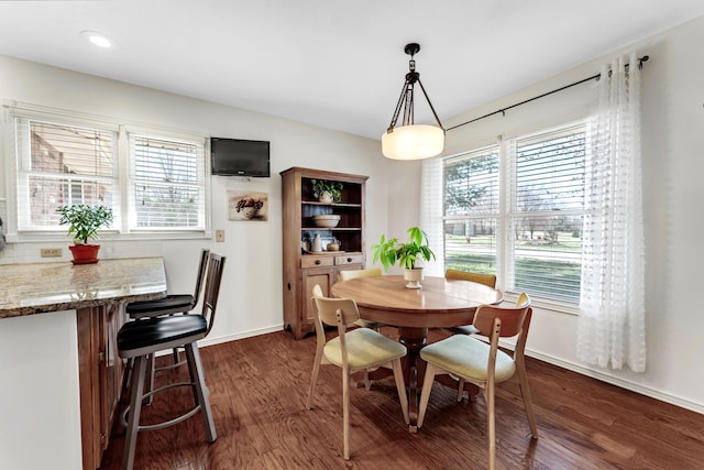 dining area featuring recessed lighting, baseboards, and dark wood-type flooring