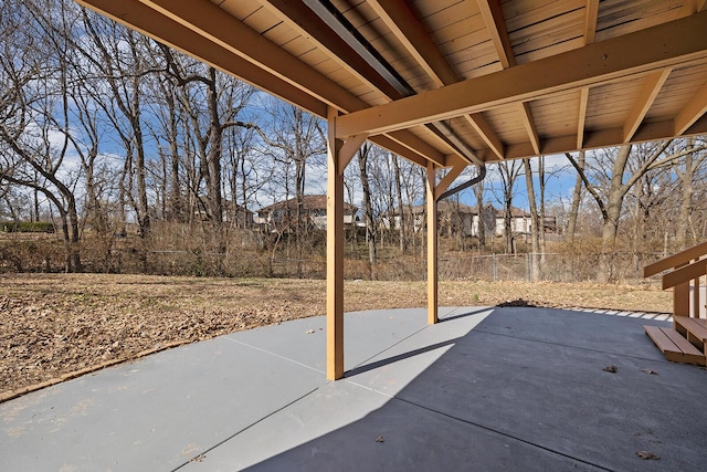 view of patio / terrace featuring fence