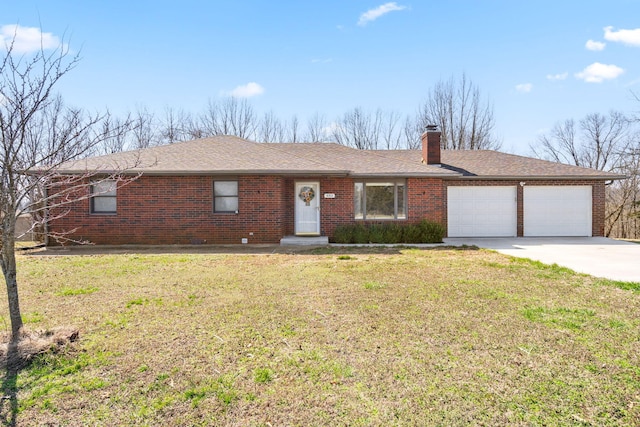 ranch-style home with a chimney, brick siding, an attached garage, and driveway