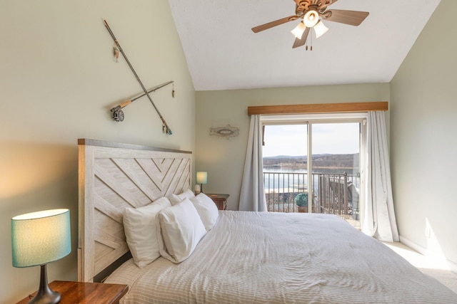 carpeted bedroom featuring access to exterior, lofted ceiling, baseboards, and a water view