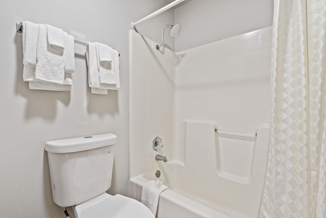 982 Indian Point Rd Unit 313, Indian Point, MO 65616 - full bathroom featuring toilet and shower / bath combo with shower curtain