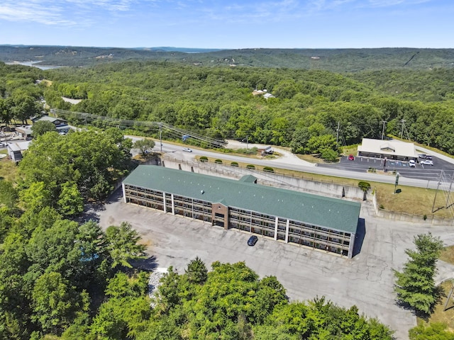 aerial view featuring a view of trees