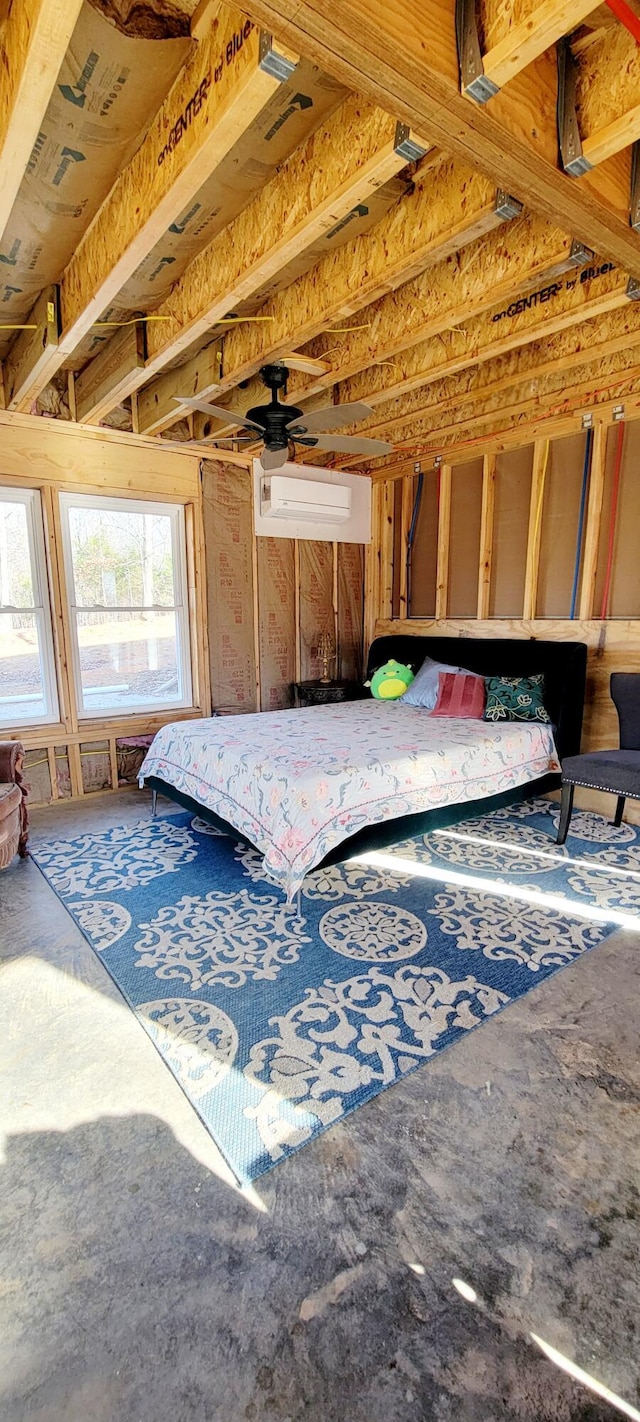 bedroom featuring a wall mounted air conditioner